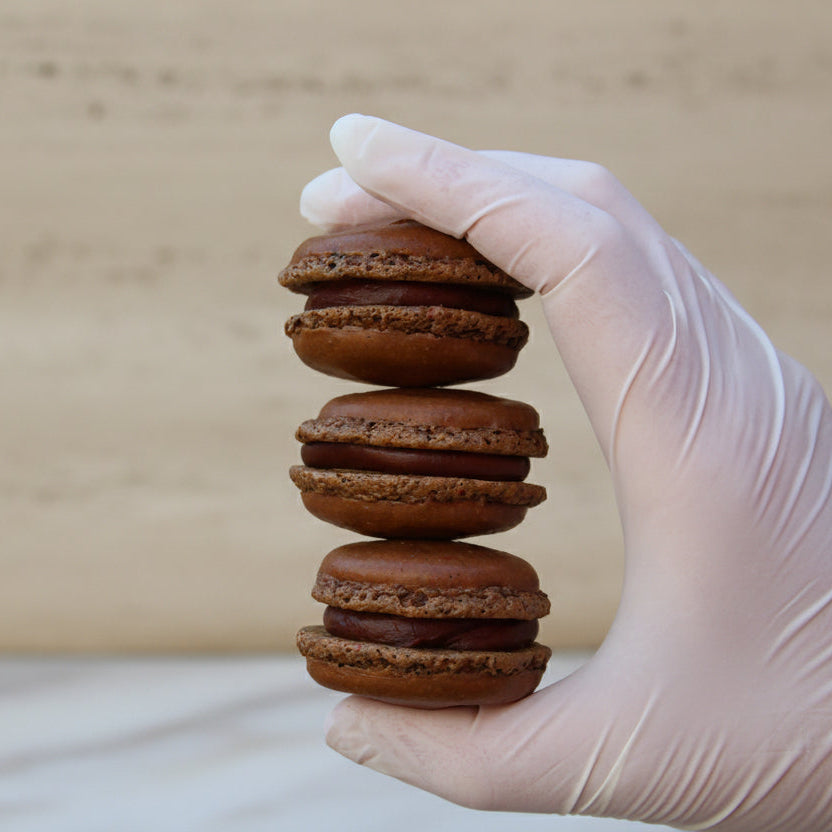 Luxury dark chocolate French macaron canapés handmade in North London for weddings and event catering
