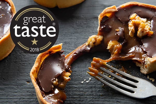 Sea salt caramel chocolate tart with walnut handmade in London bakery