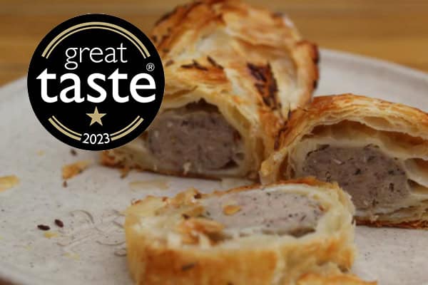 Lamb sausage roll with flaky pastry handmade in London bakery
