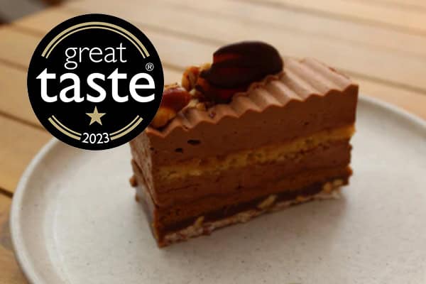 Peanut praline chocolate cake slice handmade in London patisserie
