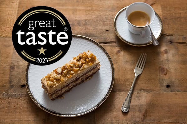 Walnut and coffee layered cake served in North London patisserie