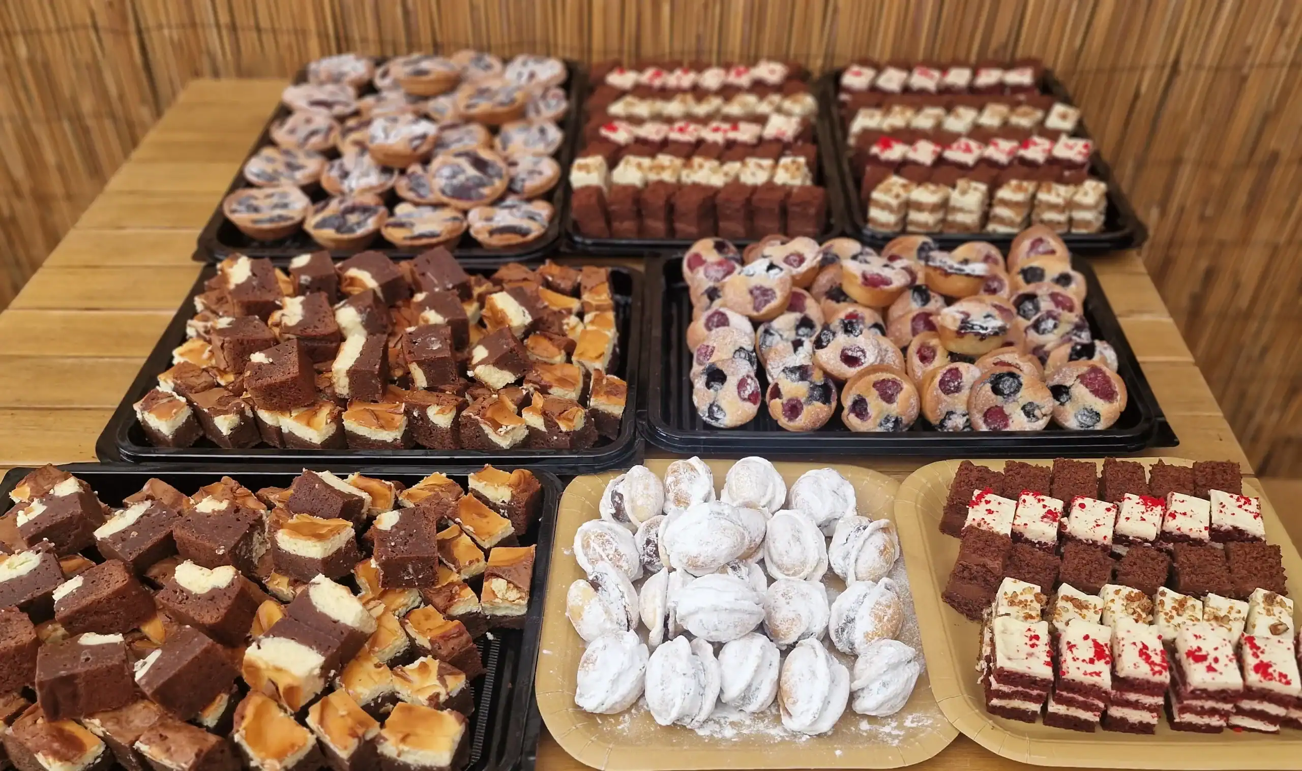 Luxury handmade canapés selection by Prestige Patisserie including mini cakes, pastries and bite-size desserts for weddings, parties and corporate catering in North London